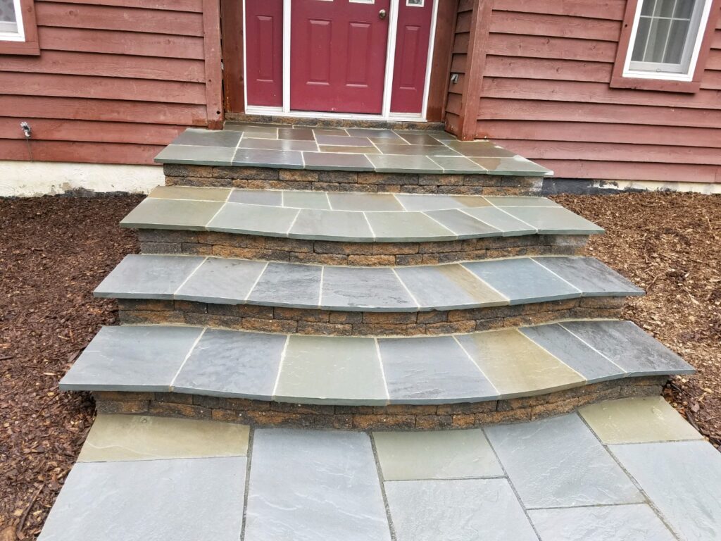 Front Entrance - Full color flagstone landing pad and treads, Village block risers, Cut flagstone walkway